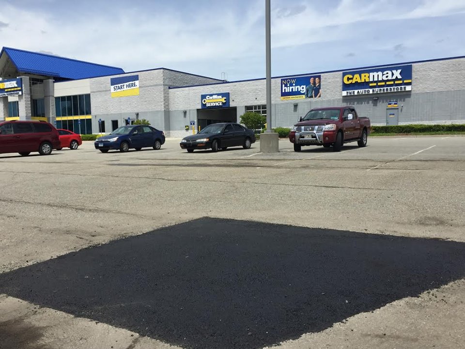 Fresh asphalt patch repair in the CarMax parking lot in East Haven, CT